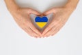 The national flag of Ukraine in female hands. The concept of patriotism, respect and solidarity with the citizens of Ukraine Royalty Free Stock Photo