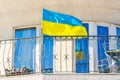 National flag of Ukraine on the hotel balcony. Patriotism concept Royalty Free Stock Photo