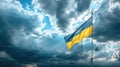 National flag of Ukraine on pole against blue cloudy sky, Ukrainian symbol Royalty Free Stock Photo