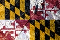 National flag of United States of Maryland against background of black and yellow chess and red white crosses on Independence Day