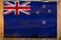 National flag  on a wooden wall background. Royalty Free Stock Photo