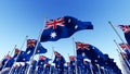 The National flags of Australia against blue sky. Royalty Free Stock Photo