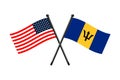 National flags of Barbados and Usa crossed