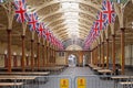 National flags dominate the interior of a Devon market hall Royalty Free Stock Photo