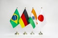 National flags of the Group of Four G4 Brazil, Germany, India and Japan on a light background. Royalty Free Stock Photo