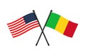 National flags of Republic of Mali and Usa crossed on the sticks