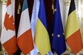 National flags of Ukraine, Canada, Italy, Belgium and the flag of the European Union during a diplomatic event in Kyiv Royalty Free Stock Photo