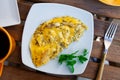 National French dish, omelet made from lightly beaten eggs with milk and herbs