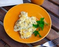 National French dish, omelet made from lightly beaten eggs with milk and herbs