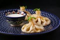 National Georgian cuisine. Khinkali with meat. Khinkali on a ceramic plate close-up