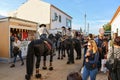 National horse fair in Golega with horse rider on the street people watching them
