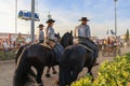 National horse fair in Golega with horse rider on the street people watching them