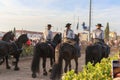 National horse fair in Golega with horse rider on the street people watching them