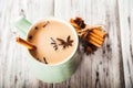 National Indian Masala tea in a clay cup. Spices for Masala and tea closeup and copy space