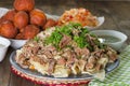 National Kazakh dishes: Beshbarmak, salad of radish Shalgam, and Baursak. Royalty Free Stock Photo