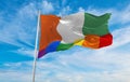 national lgbt flag of Cote d\'lvoire flag waving in the wind at cloudy sky. Freedom and love concept. Pride month. activism,