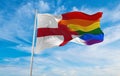 national lgbt flag of England flag waving in the wind at cloudy sky. Freedom and love concept. Pride month. activism, community