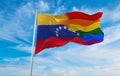 national lgbt flag of Venezuela flag waving in the wind at cloudy sky. Freedom and love concept. Pride month. activism, community