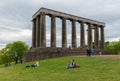 National Monument Scotland at Calton Hill Edinburgh with recreating people