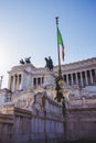 National Monument to Victor Emmanuel II with Italian flag Royalty Free Stock Photo