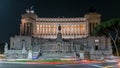 National monument of Victor Emmanuel II at night and road traffic timelapse, Rome Royalty Free Stock Photo