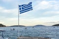 National symbol of Greece, blue-white greek flag, sea water and blue sky, copy space Royalty Free Stock Photo