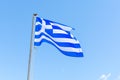 National symbol of Greece, blue-white greek flag, sea water and blue sky, copy space Royalty Free Stock Photo