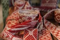 National symbols of Latvia. Closeup of Lielvarde belt stock photo. Latvian folk costumes belt. Red and grey