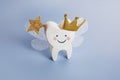 National Tooth Fairy Day. Children tooth fairy. Cute tooth with wings, a crown.