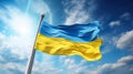 national Ukrainian blue and yellow flag on blue sky background Royalty Free Stock Photo