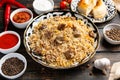 National Uzbek pilaf with meat in a cast-iron skillet