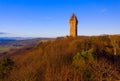 The National Wallace Monument is a tower standing on the shoulder of the Abbey Craig, a hilltop overlooking Stirling in Scotland Royalty Free Stock Photo