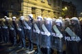 Nationalists, hooligans and fascists awaiting the Parliament Member Winnicki. On the other side of street people protesting agains Royalty Free Stock Photo