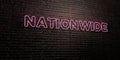 NATIONWIDE -Realistic Neon Sign on Brick Wall background - 3D rendered royalty free stock image