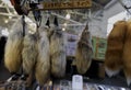 Native American dance regalia coyote and fox tails for sale at a powwow, San Francisco