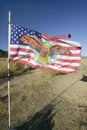 Native American Indian flag blows in wind on Chumash Indian land on highway 33, near Cuyama California Royalty Free Stock Photo