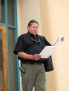 Native American man glancing at papers Royalty Free Stock Photo