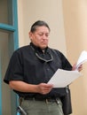 Native American man glancing at papers Royalty Free Stock Photo