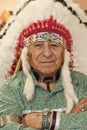 Native American Man wearing Authentic Headdress Royalty Free Stock Photo