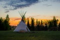 Native American Tepees on the Prairies at Sunset Royalty Free Stock Photo