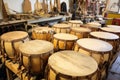 native drums waiting for their membranes on workbench