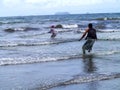 Native fishermen pull the nets , Antsiranana, Madagascar