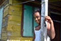 Native Nicaraguan girl smiling clapboard house Big Corn Island