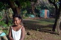 Native Nicaraguan girl smiling clapboard house Big Corn Island