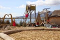 Native People at Uros Floating Islands in Lake Titicaca. Peru