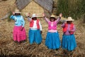 Native People at Uros Floating Islands in Lake Titicaca. Peru