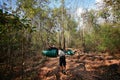 Native Thai Porters carry heavy load on his back