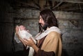 Nativity barn with Joseph and baby Jesus Royalty Free Stock Photo