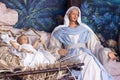 Nativity scene - beautiful statues of the Virgin Mary and baby Jesus in a manger. Christmas holiday Royalty Free Stock Photo