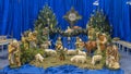 Christmas nativity scene with baby Jesus, Mary and Joseph in the manger with sheeps. Christmas event Royalty Free Stock Photo